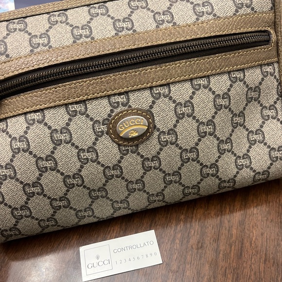 Gucci Brown Monogram Leather Clutch Bag